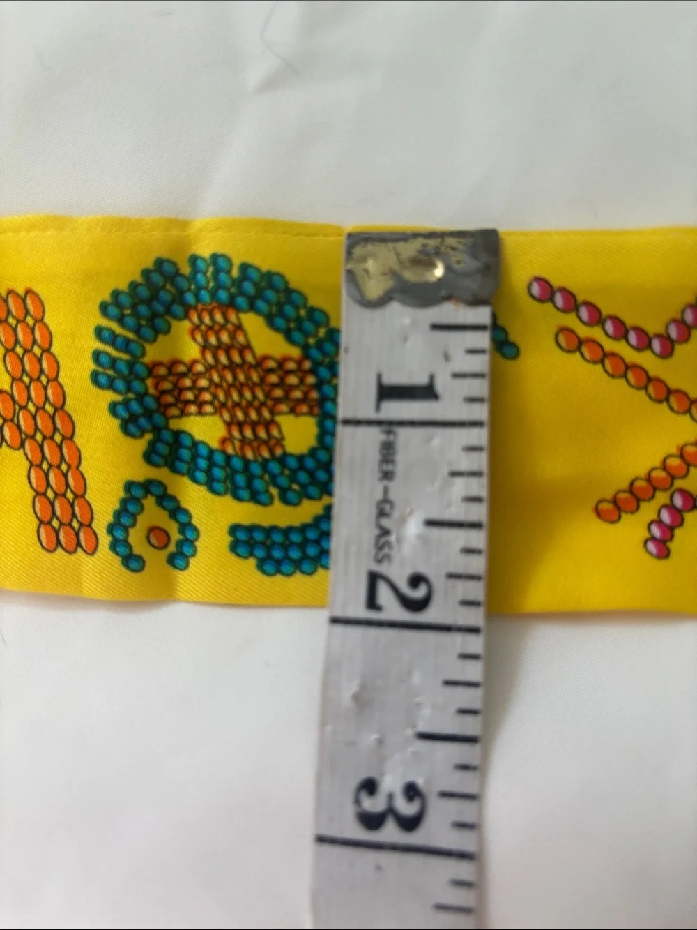 Hermes Yellow Silk Patterned Twilly Scarf with Pink and Teal Accents